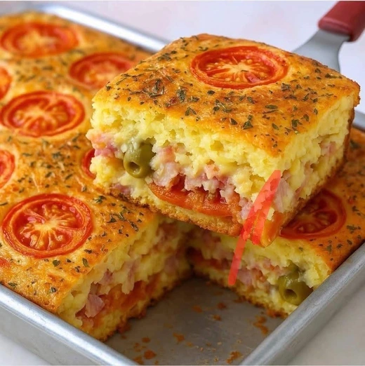 Pastel de papa relleno de jamón, queso, tomate y aceitunas verdes al horno