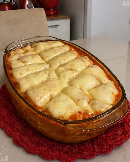 Canelones Rellenos Gratinados en Salsa Roja: El Sabor Casero que Reúne a Toda la Familia